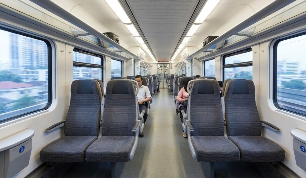 klia-ekspres-train-interior-kuala-lumpur.jpg Alt Text: Interior view of the modern and clean KLIA Ekspres train connecting Kuala Lumpur International Airport to the city center.